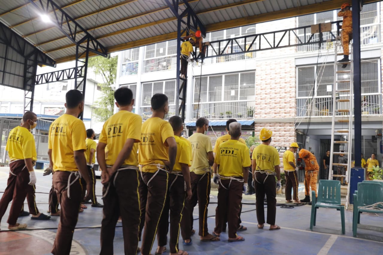 Soon-to-be-released PDLs waiting in line to take part in the Rappelling and Rope Manship Training